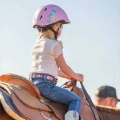 Troxel Youngster Helmet -Royal Horse Outfitters youngster helmet pink unicorn lifestyle2 54001 751 troxel 95206.1746828383